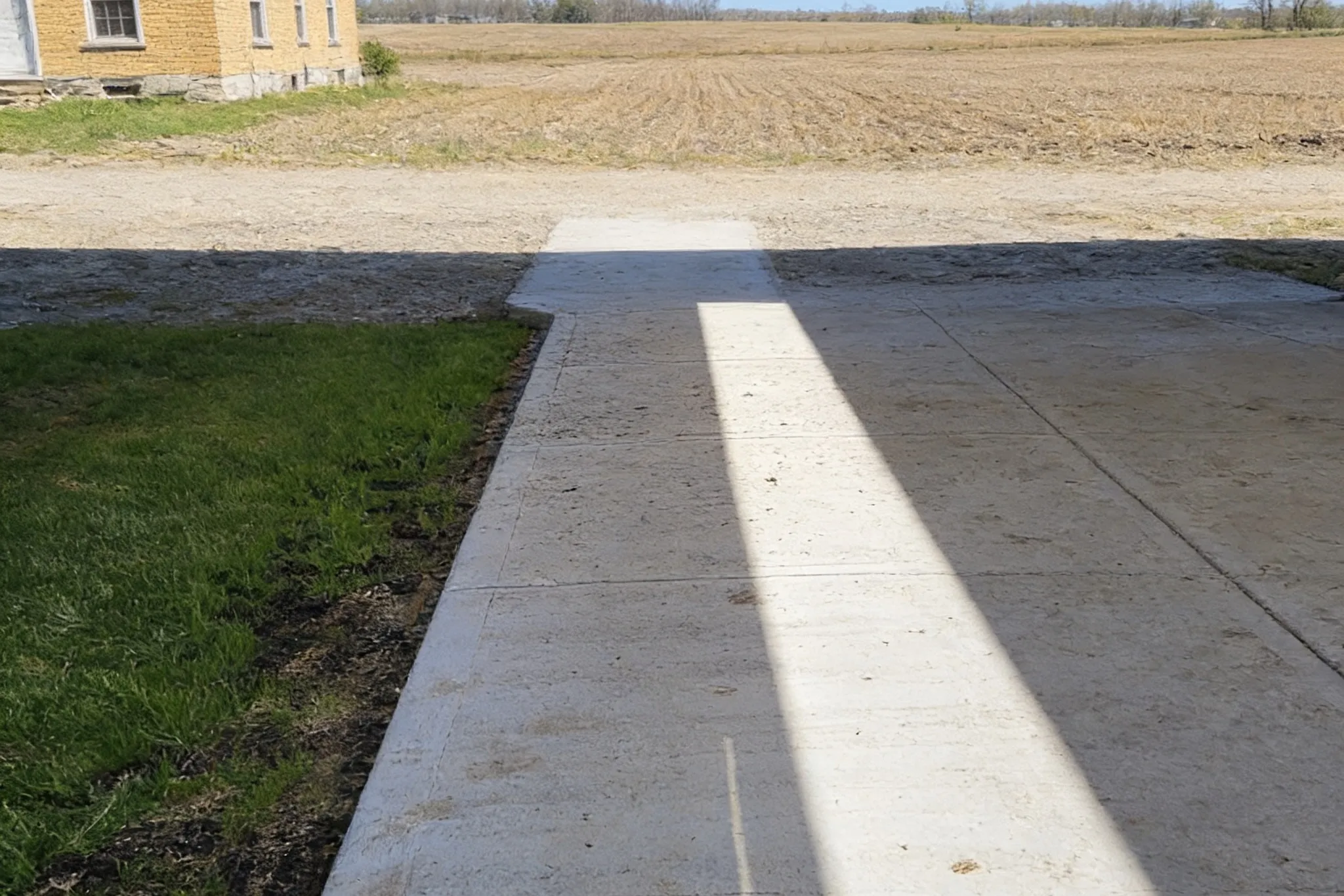 A concrete driveway at a rural Oxford County, Ontario property